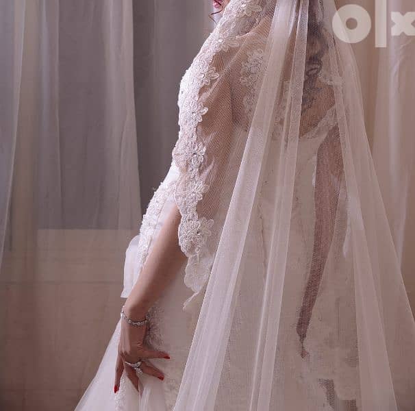 فستان زفاف بالطرحه تاني لابسه 3