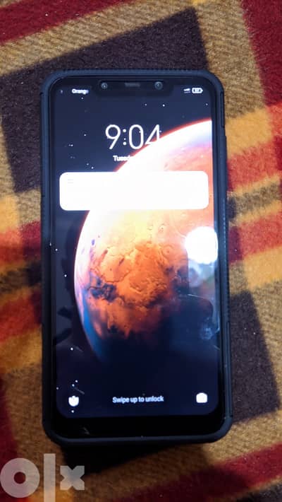 Pocophone F1 128/6 بحالة ممتازه بكامل متعلقاته