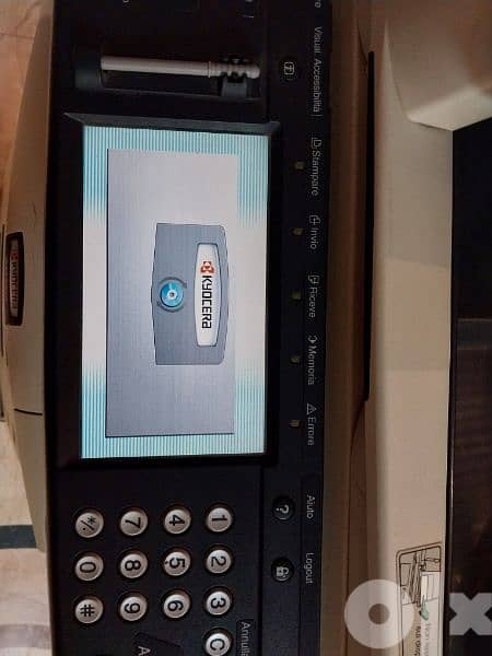 ماكينه تصوير kyocera 12