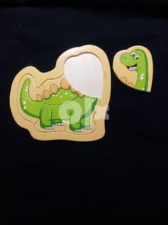 Wooden Dinosaur Puzzles   بازل للأطفال 0