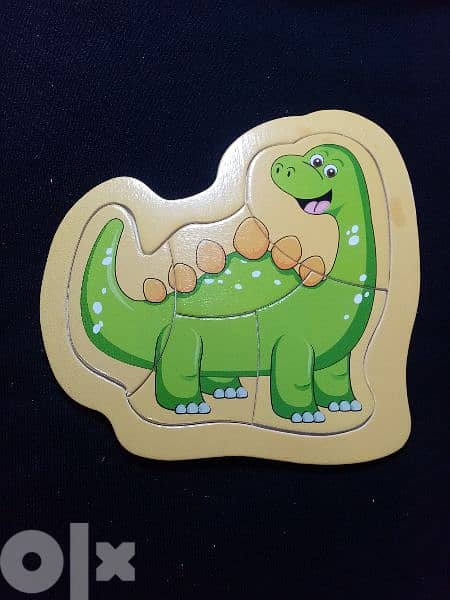 Wooden Dinosaur Puzzles   بازل للأطفال 2