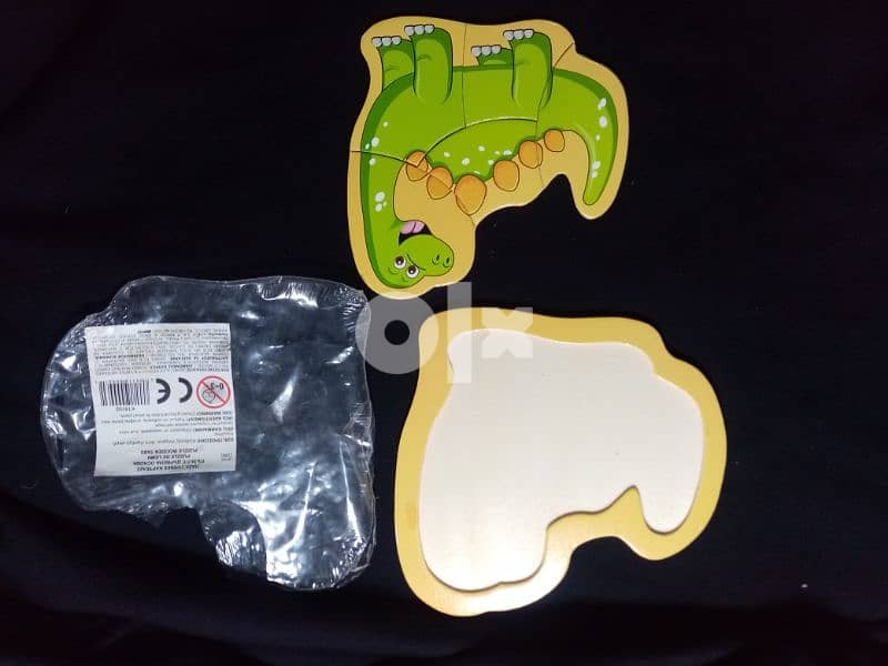 Wooden Dinosaur Puzzles   بازل للأطفال 3