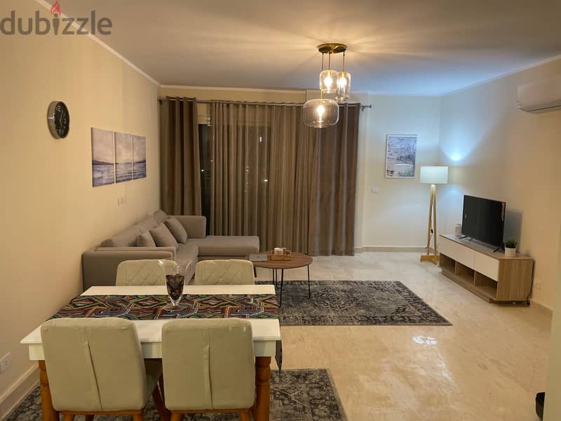 1 BR Appartment Ground floor + garden 90 Avenue - AUC شقة ارضي بحديقة 1