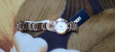 0 
DKNY NY2210 TOMPKINS ROSE GOLD PEARLIZED DIAL WOMEN'S WATCH 0