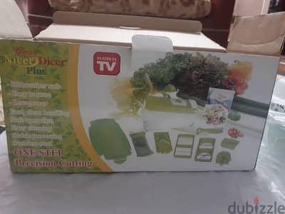 قطاعه خضروات و فاكهه و لحوم مصنعه Nicer Dicer Plus الاصليه 11×1