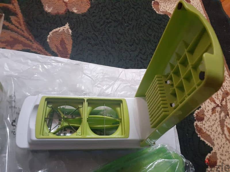 قطاعه خضروات و فاكهه و لحوم مصنعه Nicer Dicer Plus الاصليه 11×1 2