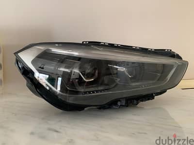 BMW X1 head light 2021 (barely used)     فانوس بي ام دابليو X1 2021