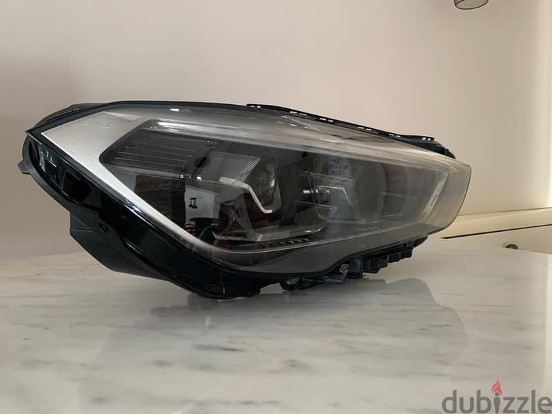 BMW X1 head light 2021 (barely used)     فانوس بي ام دابليو X1 2021 3