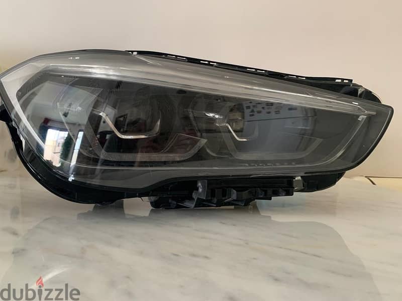BMW X1 head light 2021 (barely used)     فانوس بي ام دابليو X1 2021 4