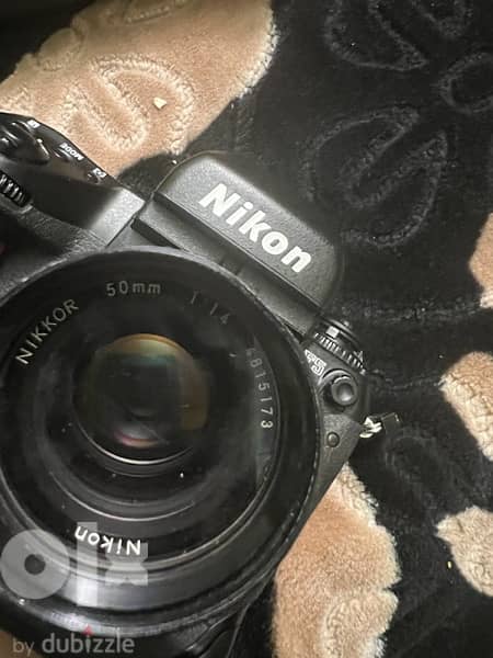 Nikon  zoom Nikkor c auto 1:3.5 f =43 86mm 596800 نيكون f5 1