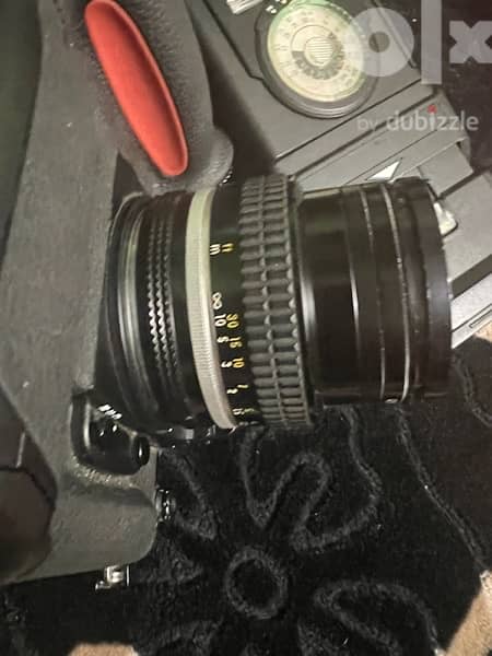 Nikon  zoom Nikkor c auto 1:3.5 f =43 86mm 596800 نيكون f5 3