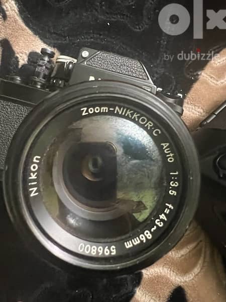 Nikon  zoom Nikkor c auto 1:3.5 f =43 86mm 596800 نيكون f5 4