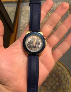 Guess rose gold X blue leather watch