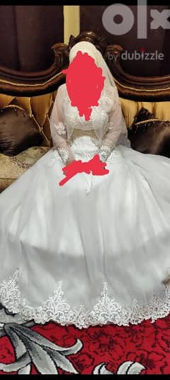 فستان زفاف ابيض وارد الخارج من دبي