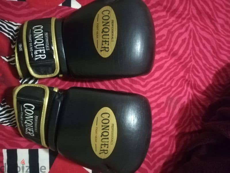 conquer boxing gloves like new 16 Oz 0