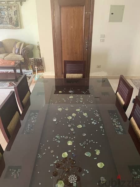 A nearly new complete modern table 1