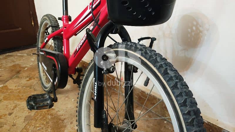 دراجه ترينكس اللون احمر مقاس 24 دراجه جبليه المركه ترينكس 1