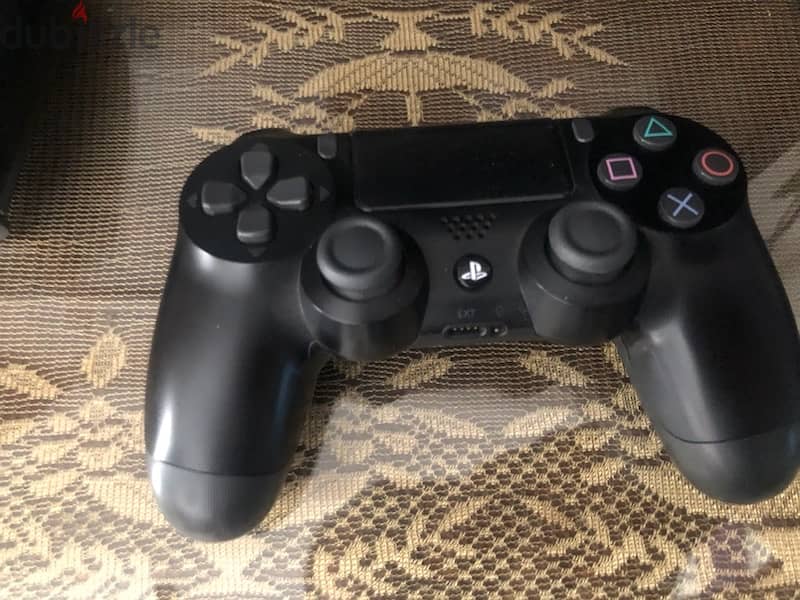 playstation 4 slim 1 tera with 2 controllers , condition :  excellent 2