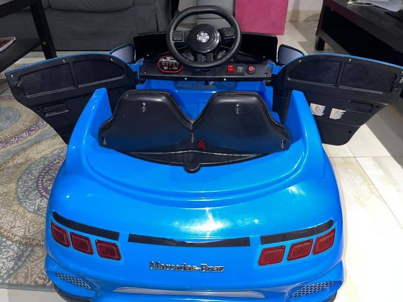 Electric kids car used for 1 month only عربية اطفال ٤ موتور بالريموت 3