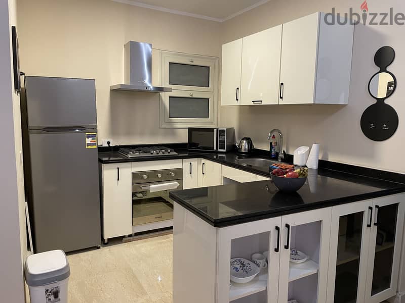 1 BR Appartment Ground floor + garden 90 Avenue - AUC شقة ارضي بحديقة 2