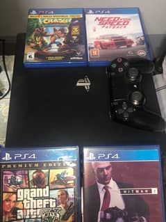 اPlayStation 4 pro 1tb with one controller and 4 cd 0