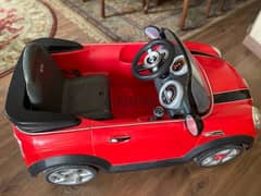a car for kids up to 4-5 years with remote control 0
