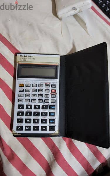 الة حاسبة (calculator) sharpEL-512 1