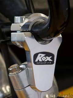 Rox motorcycle HANDLEBAR RISER for lowe back pain relief.