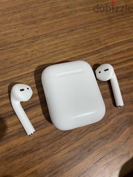 Apple AirPods (2nd Generation) original With Charging Case 0