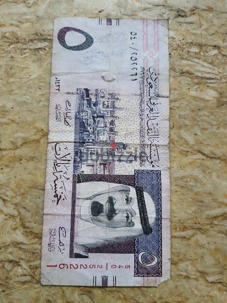 عملة قديمة ٢ دولار كندي الملكة إليزابيث وعملات منوعه مصريه وسعوديه 3