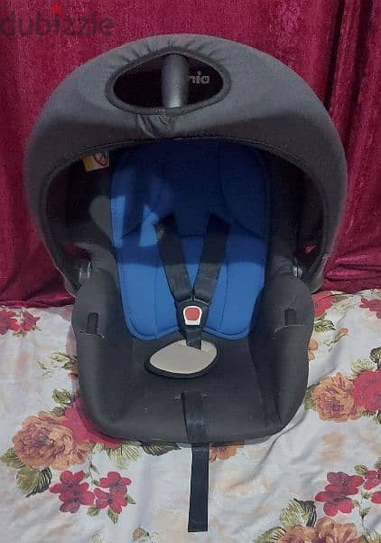 nania car seat  كرسي اطفال للسيارة بحامل للتنقل بالطفل 3
