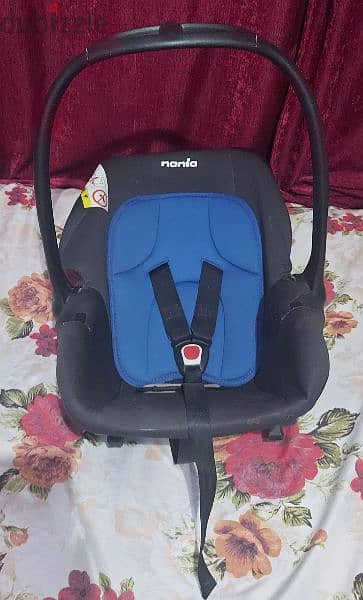 nania car seat  كرسي اطفال للسيارة بحامل للتنقل بالطفل 5