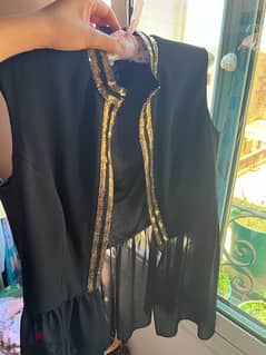 black blouse Nasila fashion designer