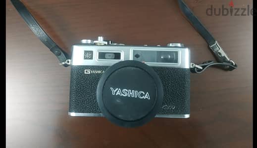 كاميرا yashica  ياباني تصوير فوتوغرافي معها فلاش وحامل