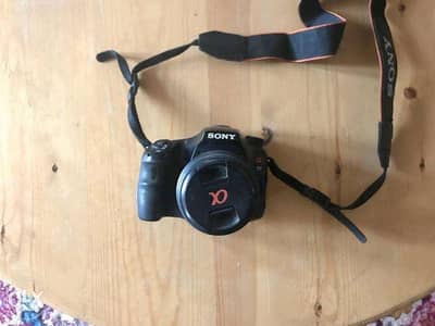 Sony Alpha 57 + 18-55 Lens + Macro 75-300 Lens(Battery, Charger & Bag)
