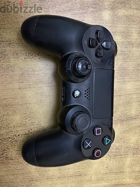 PS 4 with 2 controllers and 3 games + a new separate controller 0