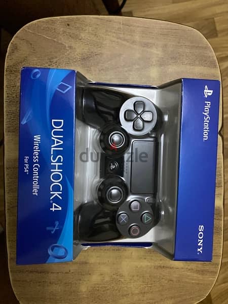 PS 4 with 2 controllers and 3 games + a new separate controller 6