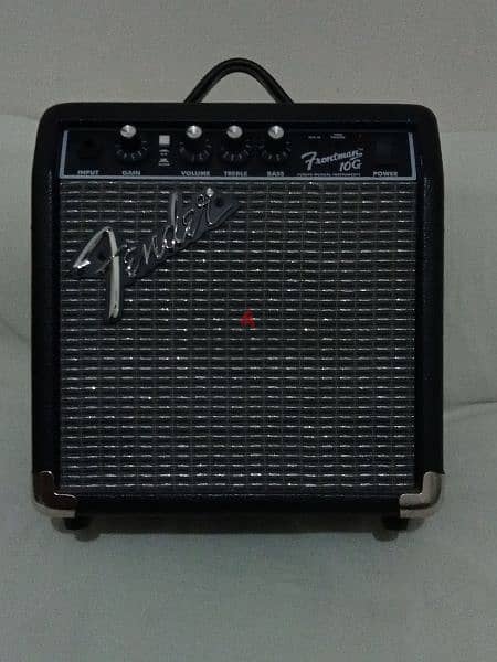 original electric guitar fender and an amplifier fender frontman 10g 6