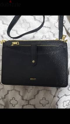 dkny original . . 100%leather