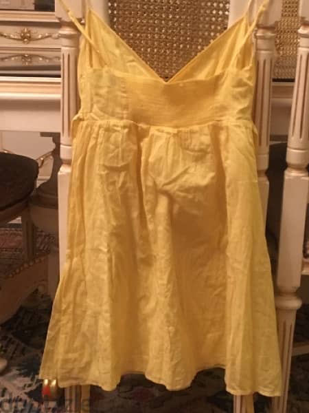 فستان اصفر بسعر لقطة 1