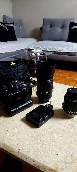 nikon 5100d + 2 lens + battery grib 0