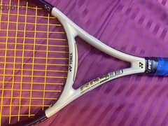Tennis Racket with its cover