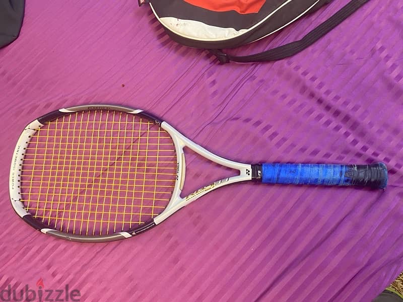Tennis Racket with its cover 1