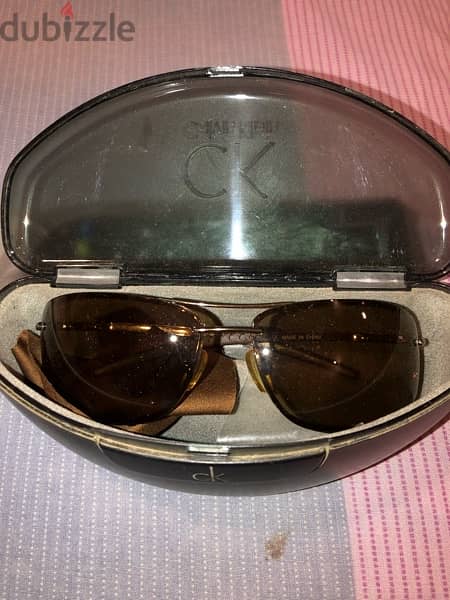 a new sunglasses brand new with it’s box 1