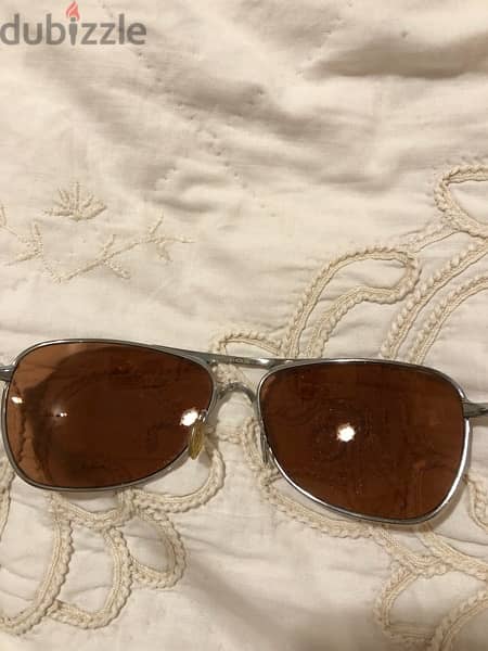 used with care an Oklay sunglass with no glass 2