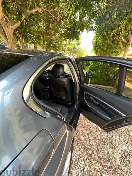 BMW 320i Luxury (اول مالك) 3