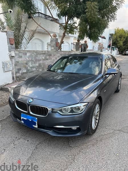 BMW 320i Luxury (اول مالك) 7