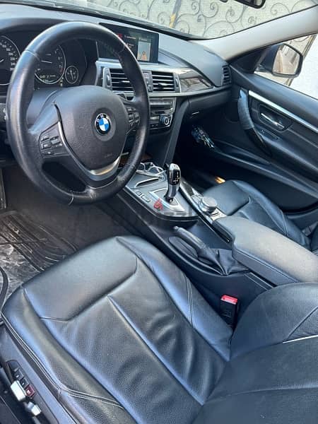 BMW 320i Luxury (اول مالك) 8