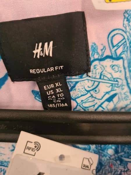 Original NEW H&M Shirt. . قميص لم يستخدم من h&m سبونج بوب 9