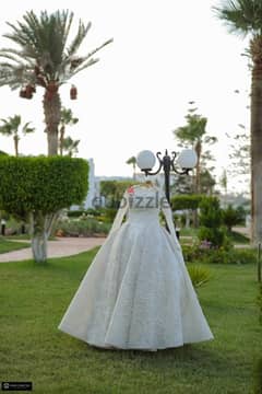 for rent - used only once - wedding dress by Dema khoudier 0